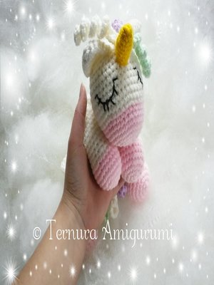 cover image of crochet pattern CUDDLY UNICORN